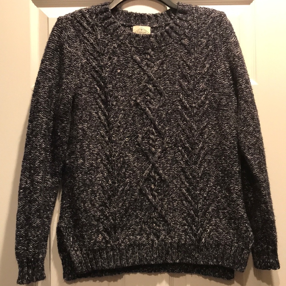 Navy blue sweater with white threads throughout